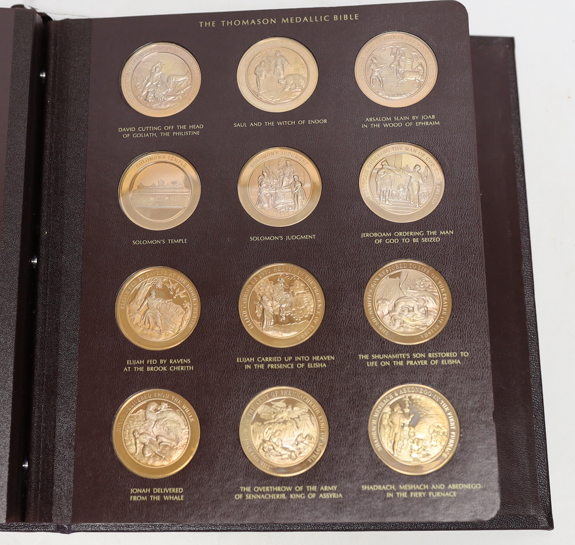 The Thomason Medallic Bible, Franklin mint version, sixty medals in a folder